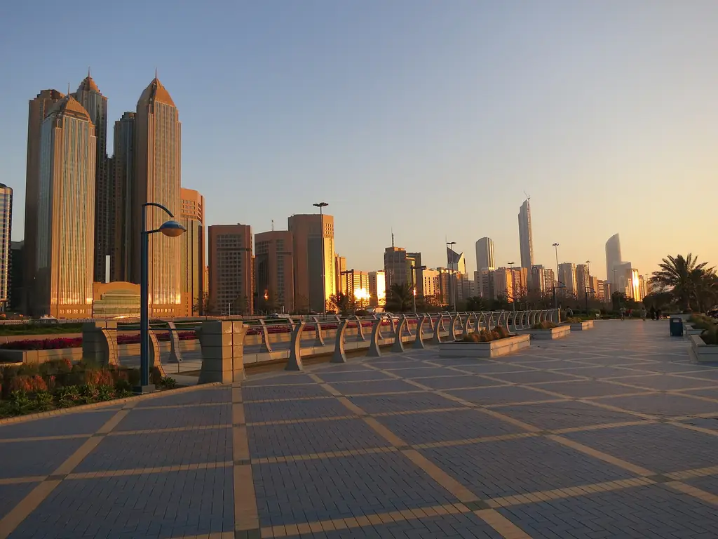 Towers along the Corniche promenade in Abu Dhabi at golden hour